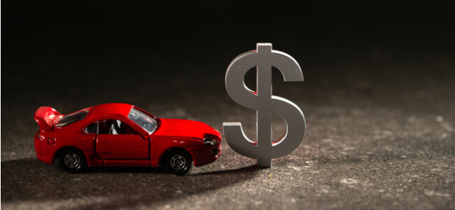 Dollar currency symbol with red car
